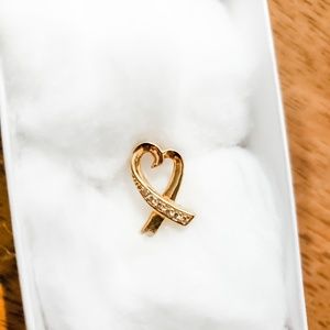 Heart-shaped pendant in 18K Gold with CZ detail